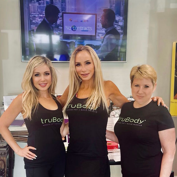 three women wearing truBody shirts